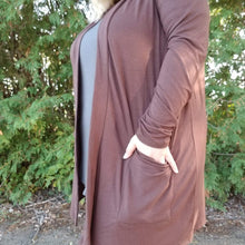Load image into Gallery viewer, perfectly soft and cozy cardigan. Made from a tshirt material with slouchy pockets. Americano color and 33" long.